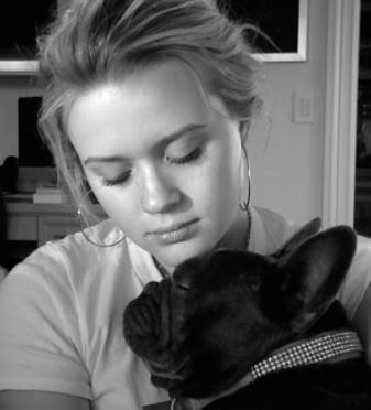 Ava Elizabeth Phillippe with her late pet dog Pepper.